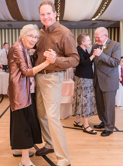 Mom and Greg dancing